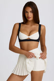 Soft Active Crossover Pleated Mini Skort in Coconut