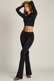 Asymmetric Draped Mid Rise Flared Trousers in Black