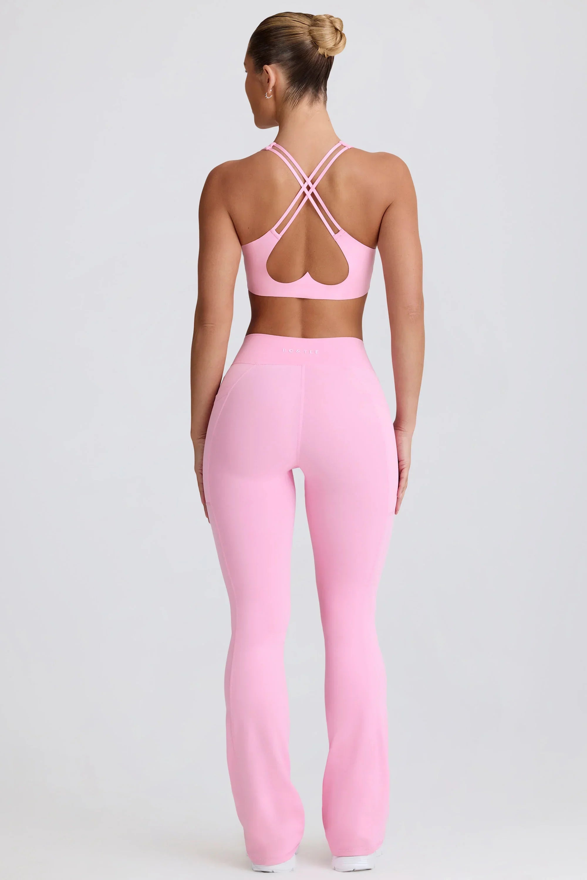 Soft Active V Waist Pocket Flared Leggings in Baby Pink