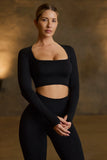 Super Sculpt Seamless Long Sleeve Crop Top in Black