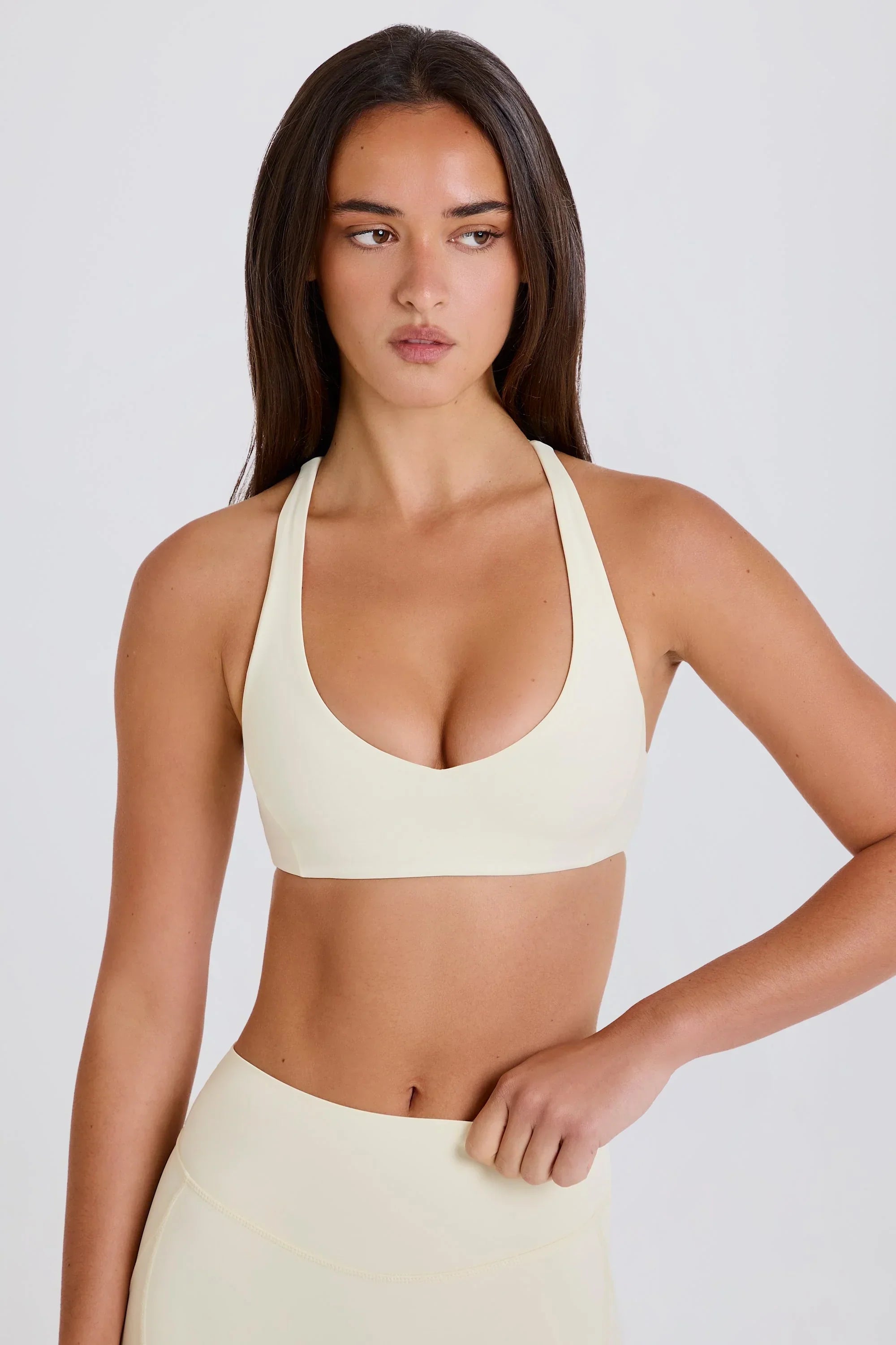 Crossback V Neck Sports Bra in Cream