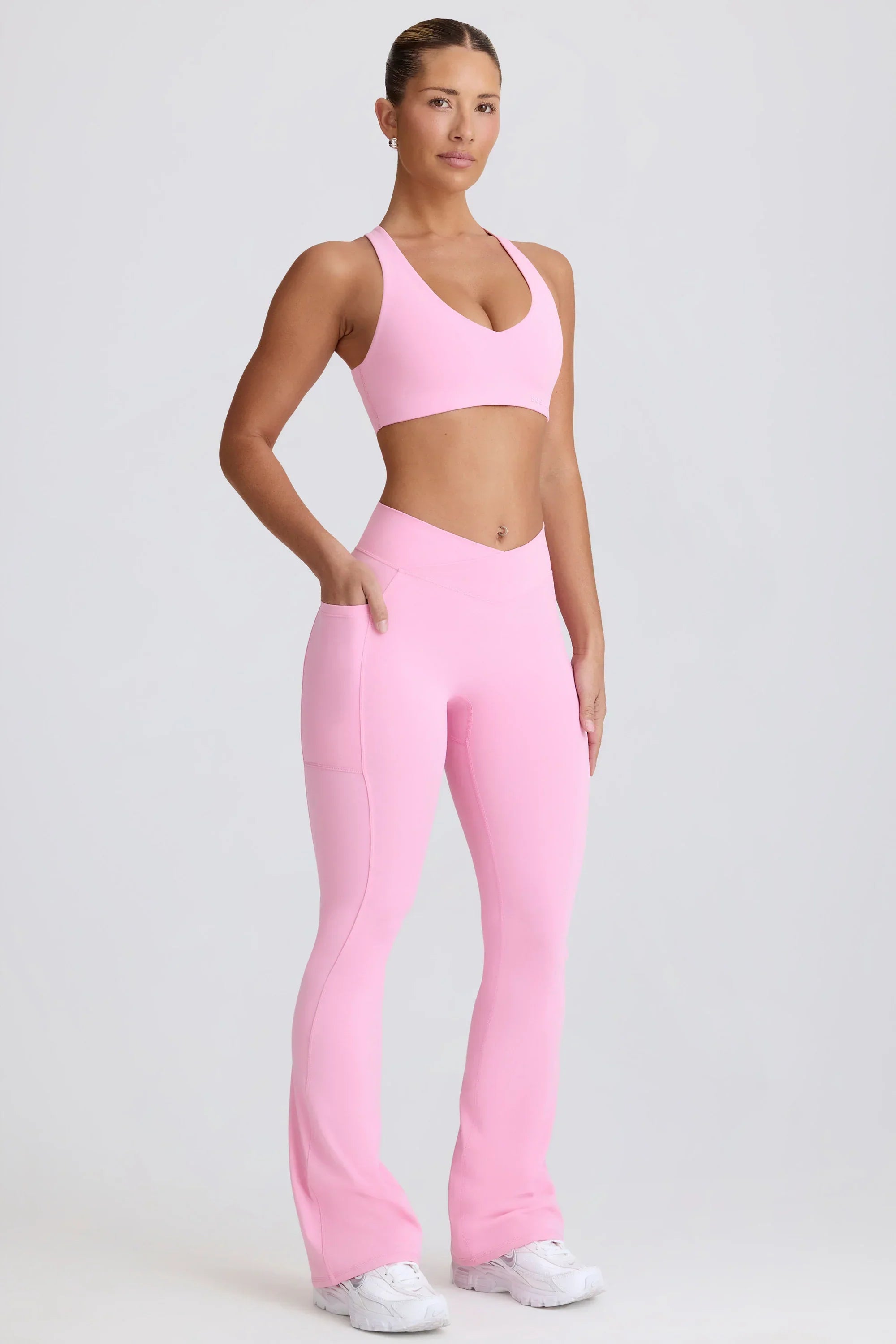 Soft Active V Waist Pocket Flared Leggings in Baby Pink