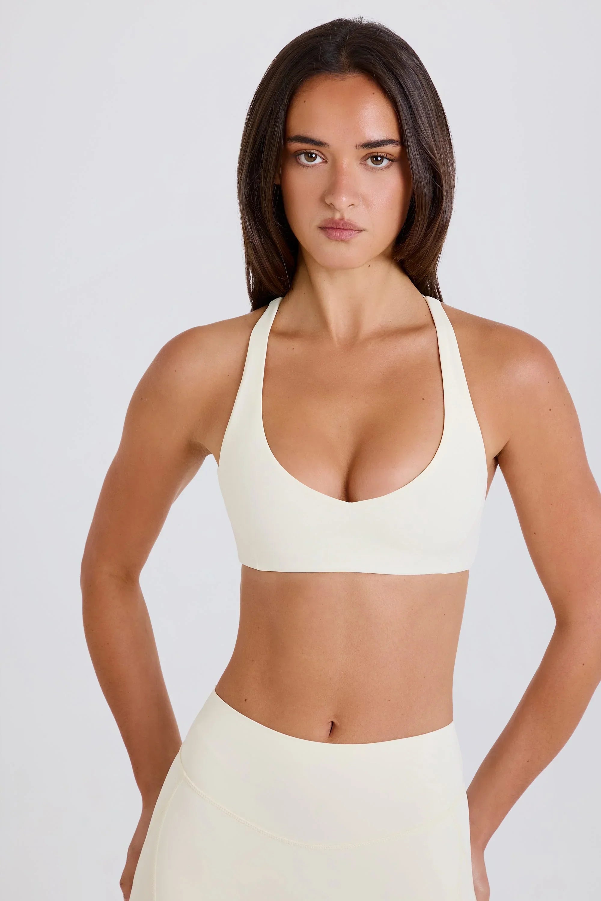 Crossback V Neck Sports Bra in Cream