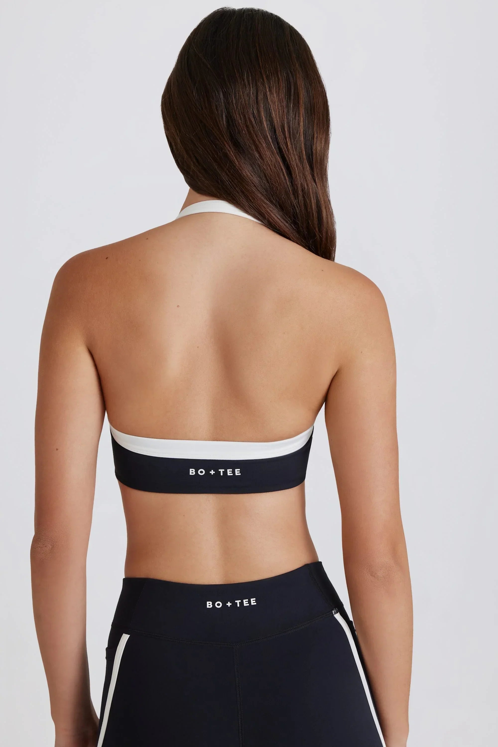 Soft Active Twist Front Halterneck Sports Bra in Black