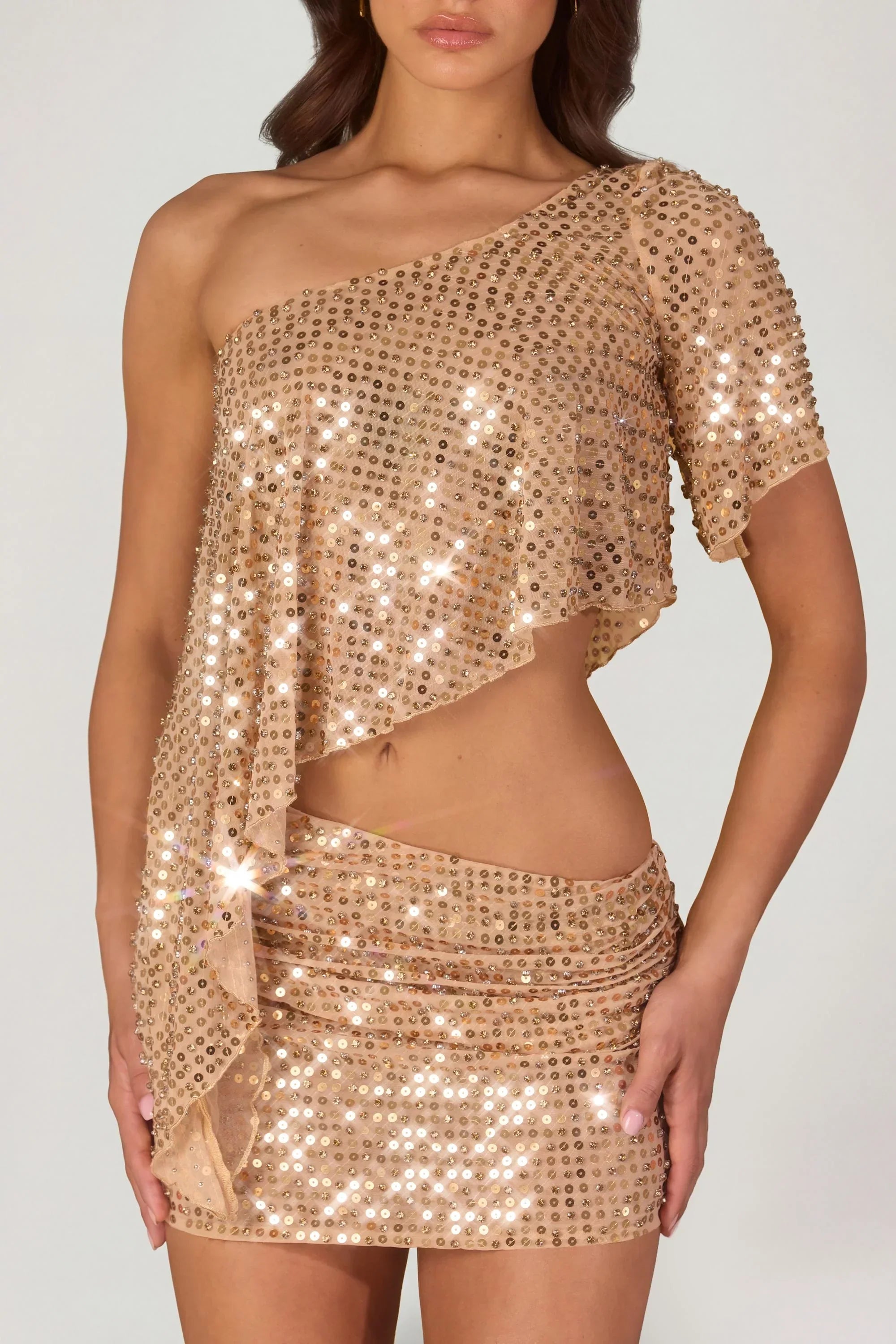Embellished One Shoulder Asymmetric Top in Gold