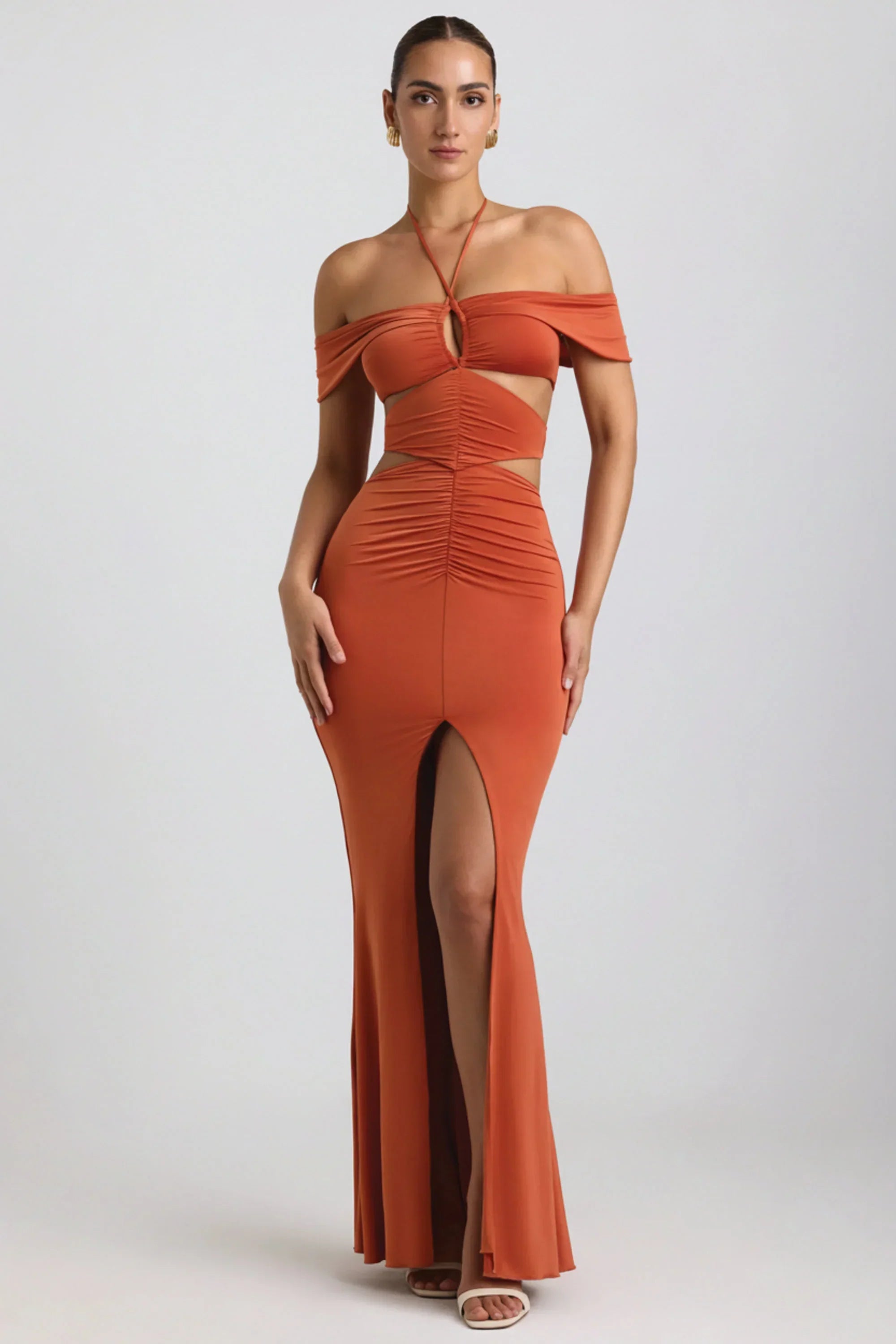 Slinky Jersey Cut Out Halterneck Gown in Burnt Orange