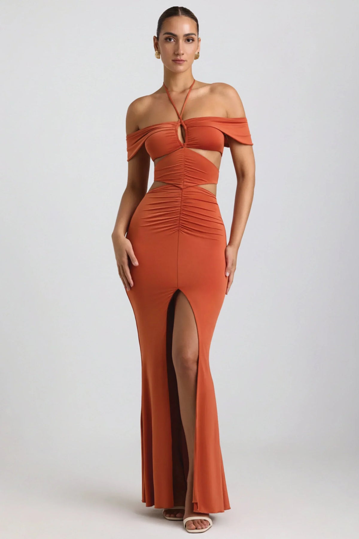 Slinky Jersey Cut Out Halterneck Gown in Burnt Orange