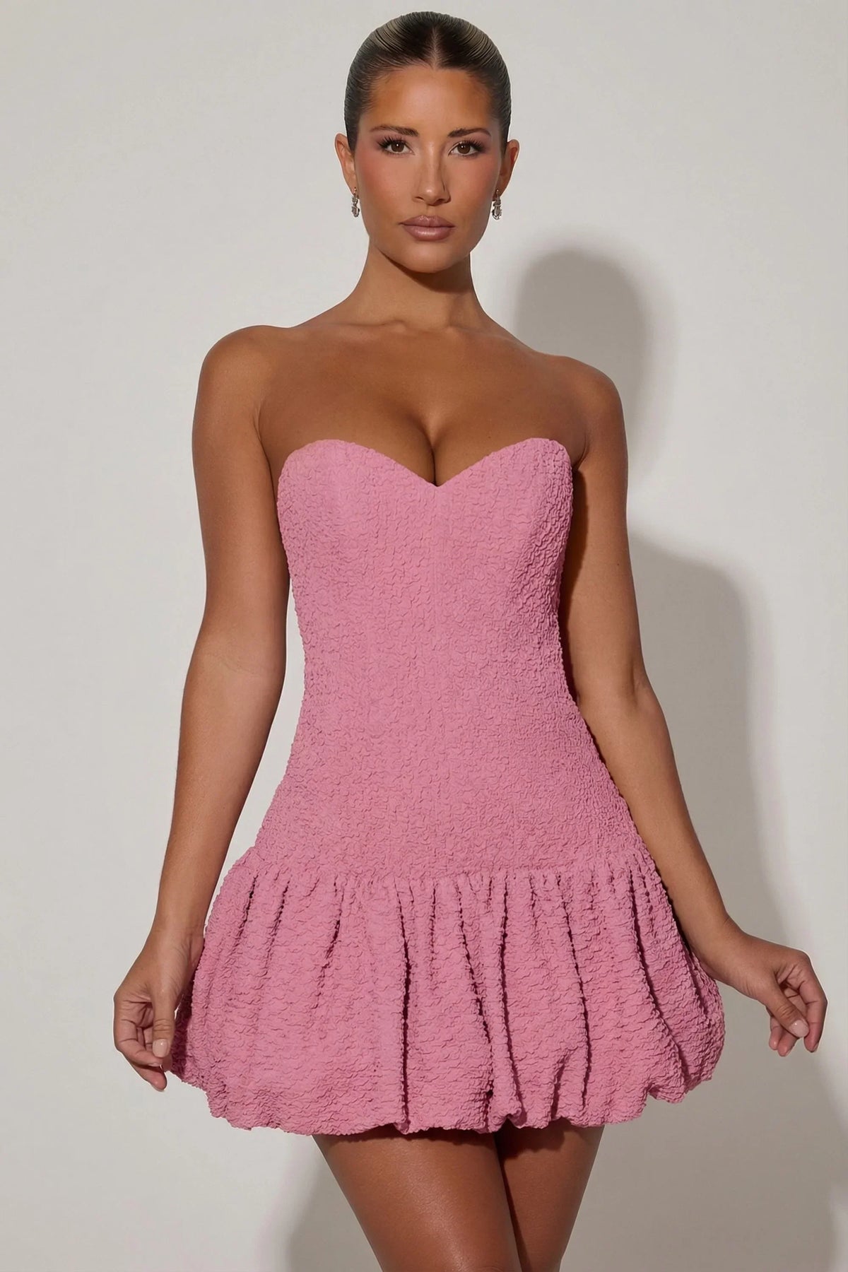 Cut Out Bubble Hem Corset Mini Dress in Dusty Pink