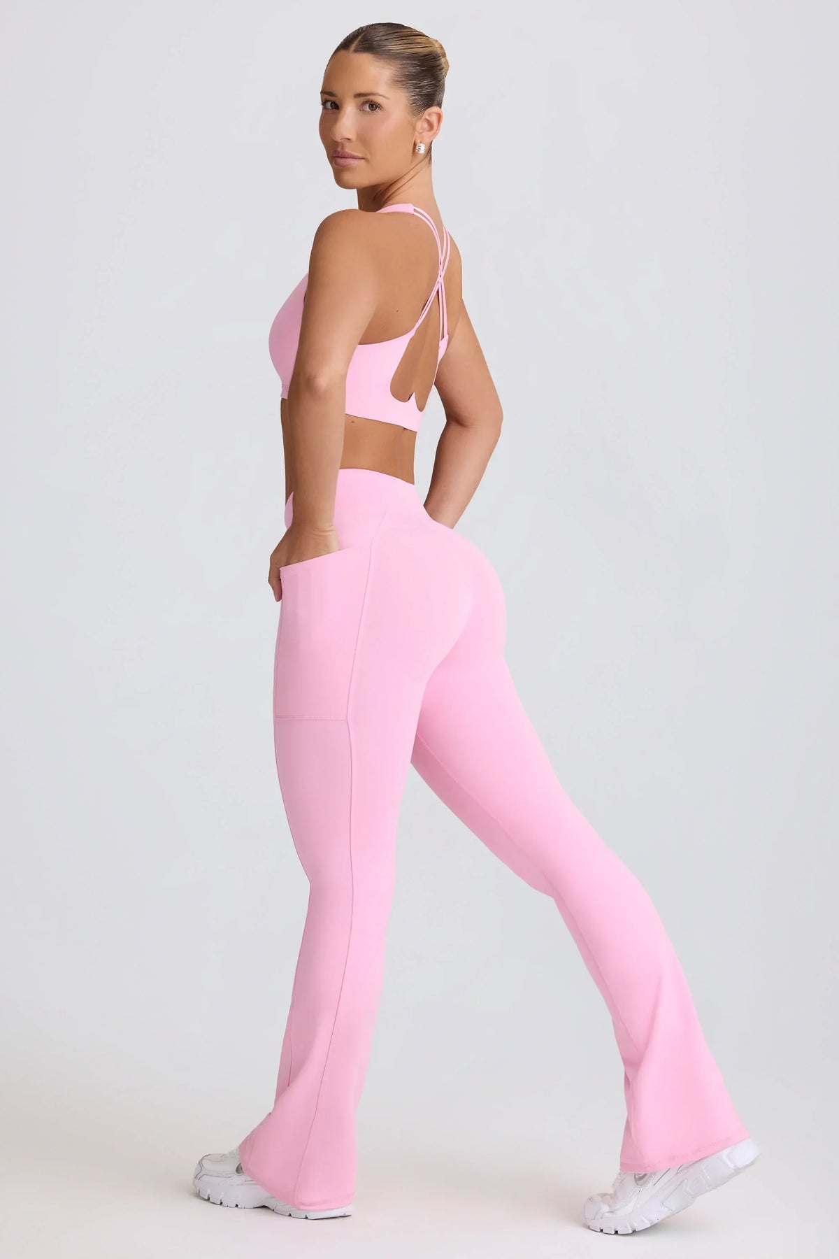 Soft Active V Waist Pocket Flared Leggings in Baby Pink