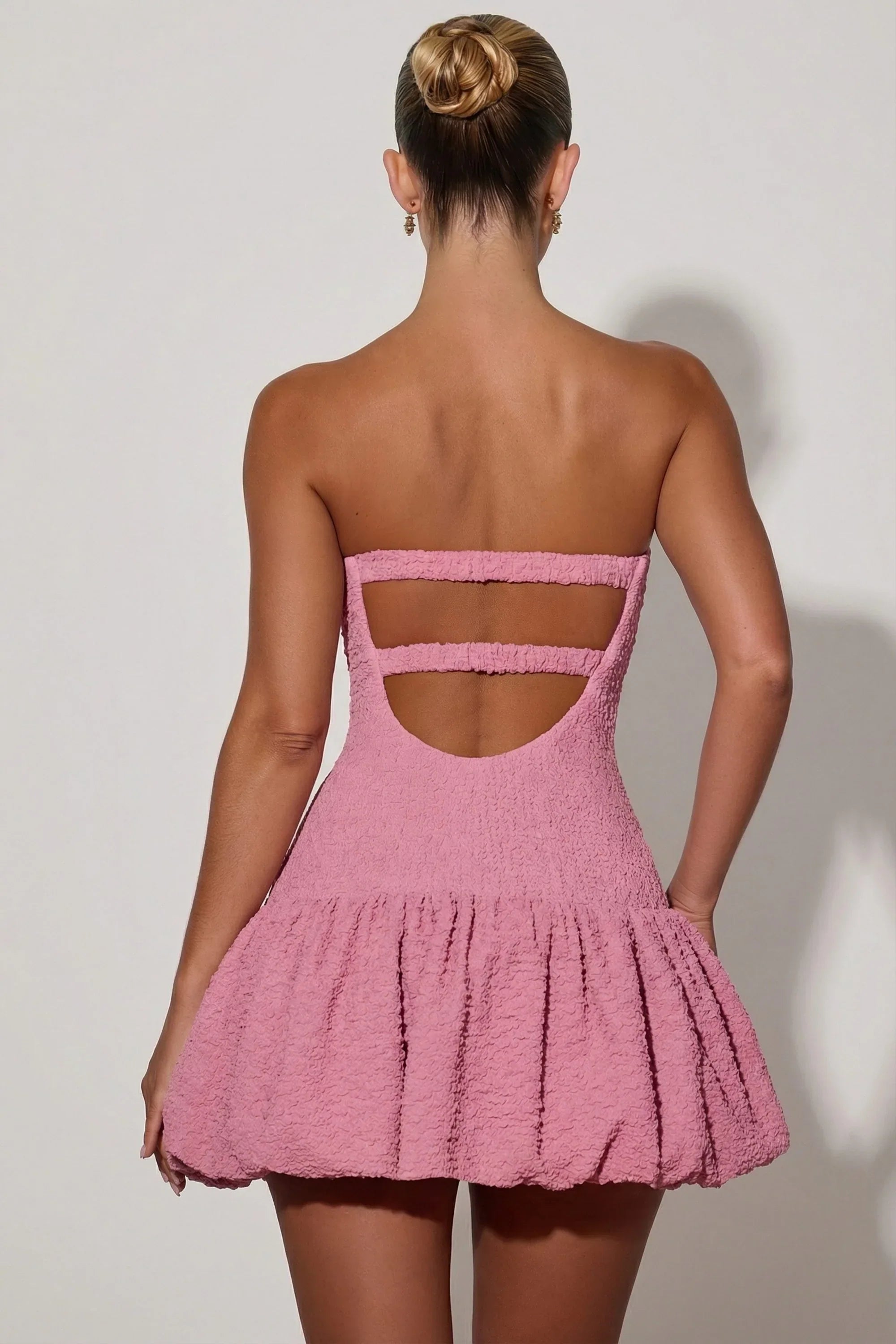 Cut Out Bubble Hem Corset Mini Dress in Dusty Pink