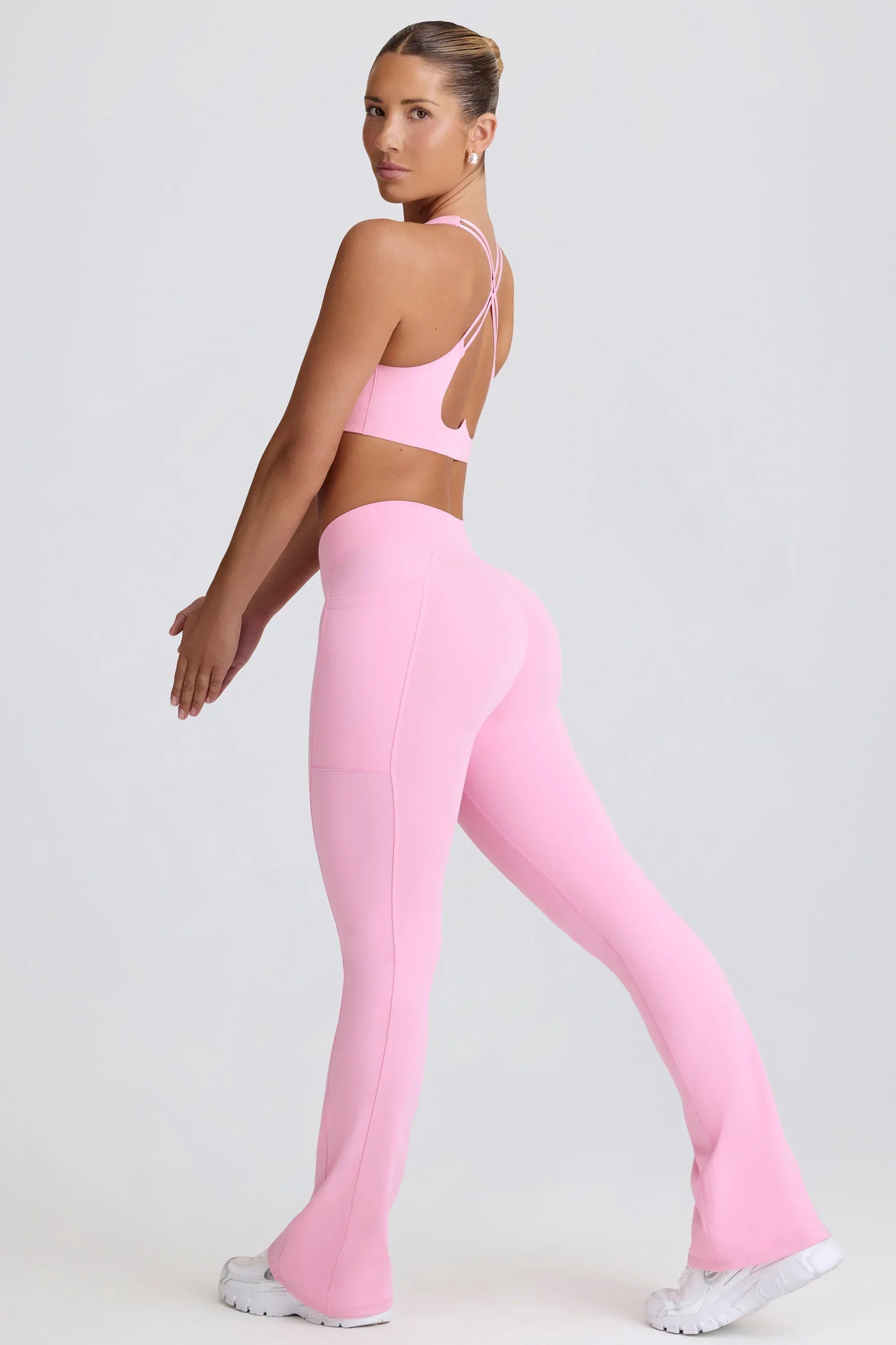 Soft Active V Waist Pocket Flared Leggings in Baby Pink
