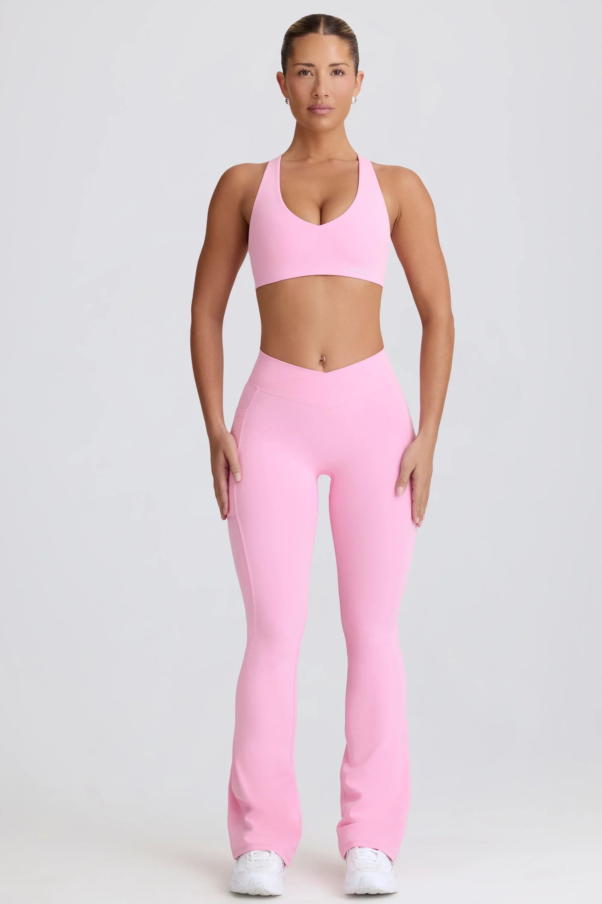 Soft Active V Waist Pocket Flared Leggings in Baby Pink