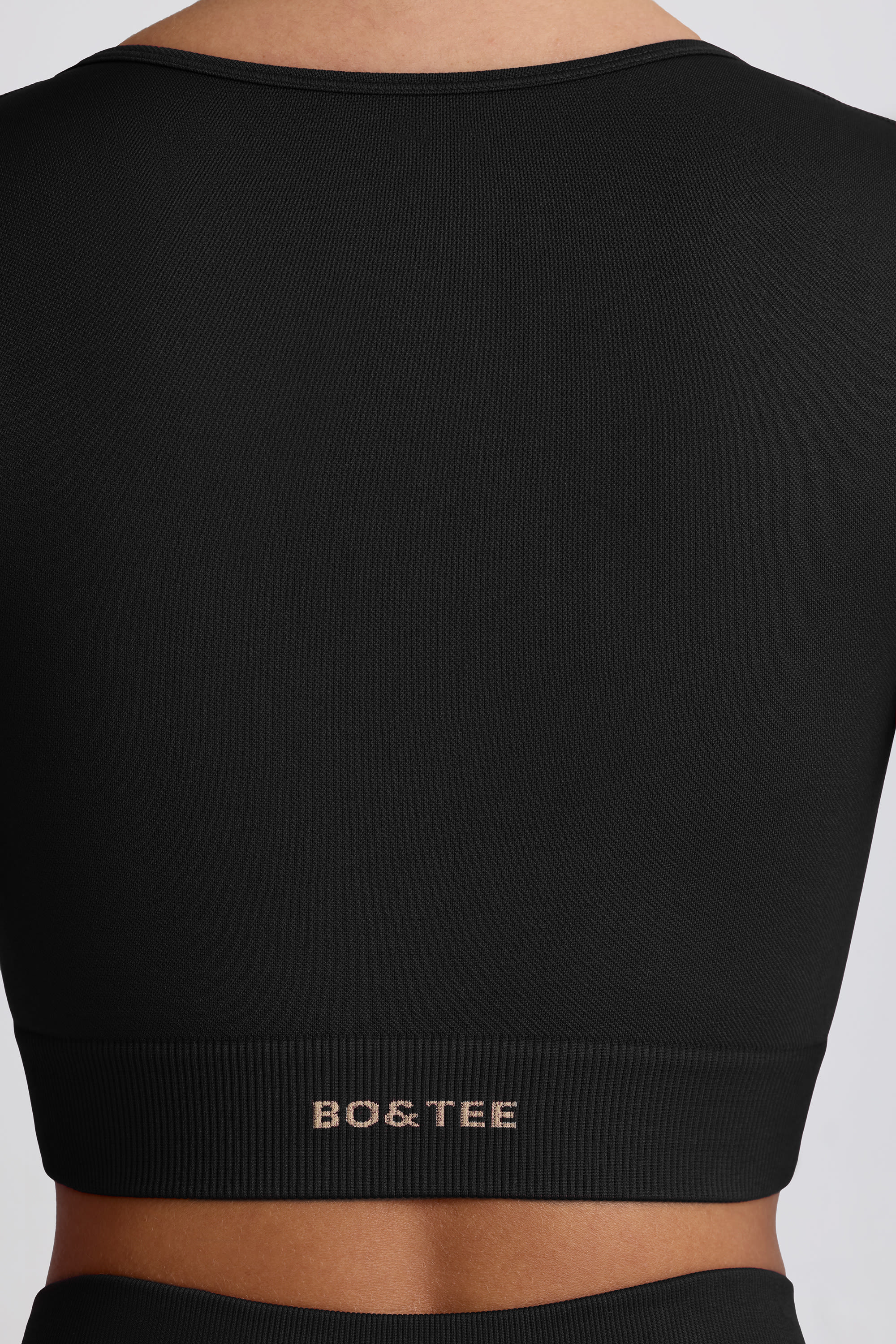 Super Sculpt Seamless Long Sleeve Crop Top in Black