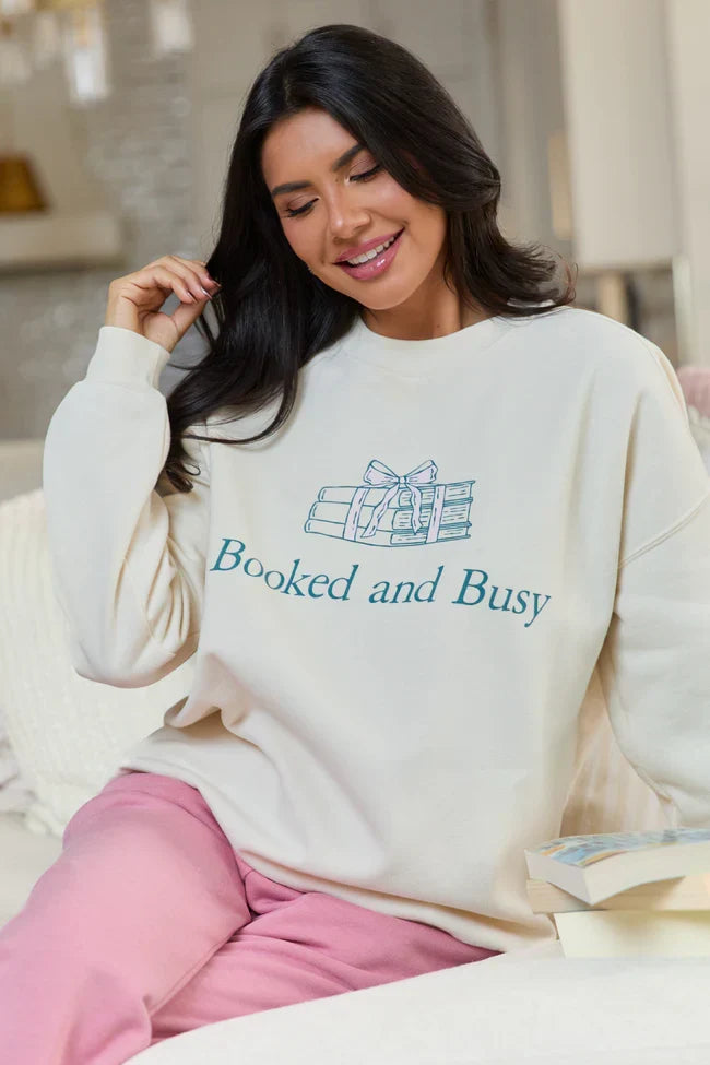 Booked Busy Cream Graphic Sweatshirt
