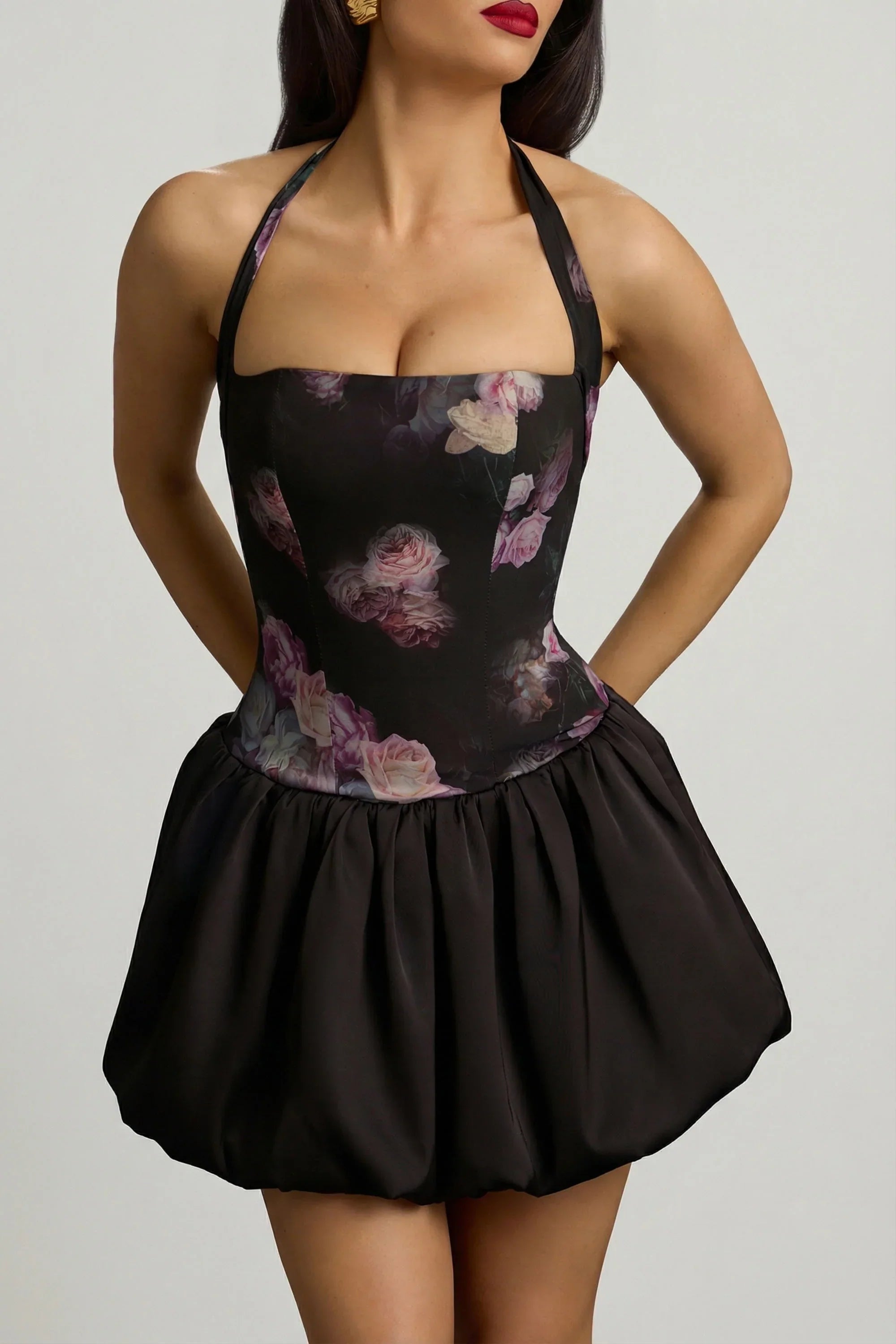 Halterneck Lace Up Bubble Hem Mini Dress in Black Floral Print
