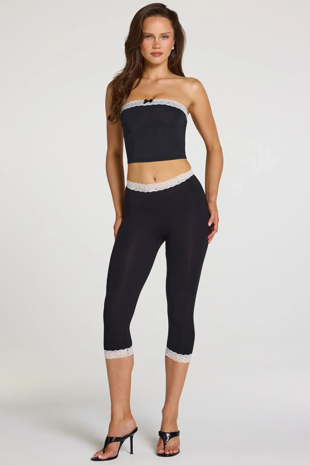 Modal Lace Trim Mid Rise Capri Leggings in Black