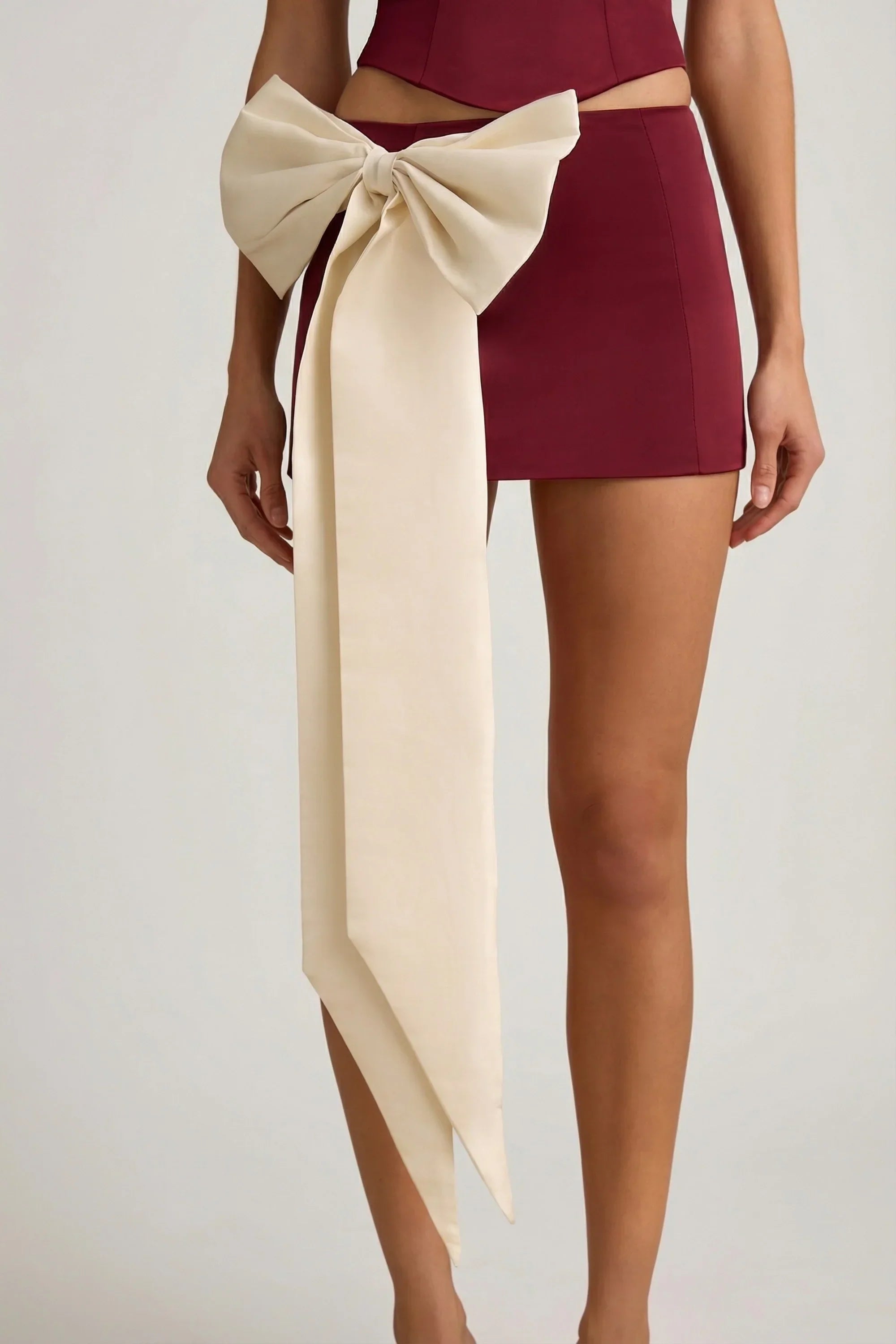 Satin Bow Detail Low Rise Mini Skirt in Wine Red
