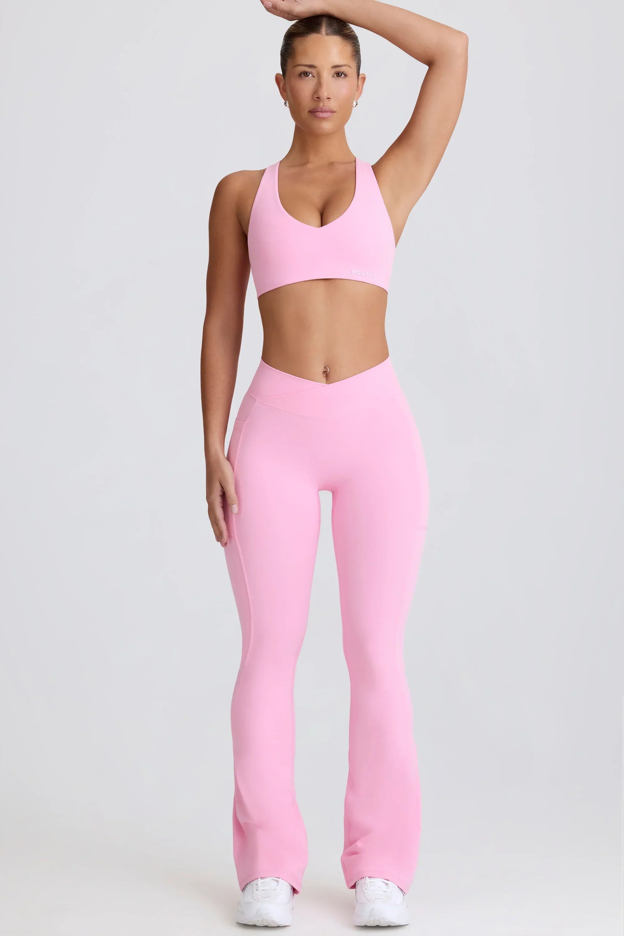 Soft Active V Waist Pocket Flared Leggings in Baby Pink