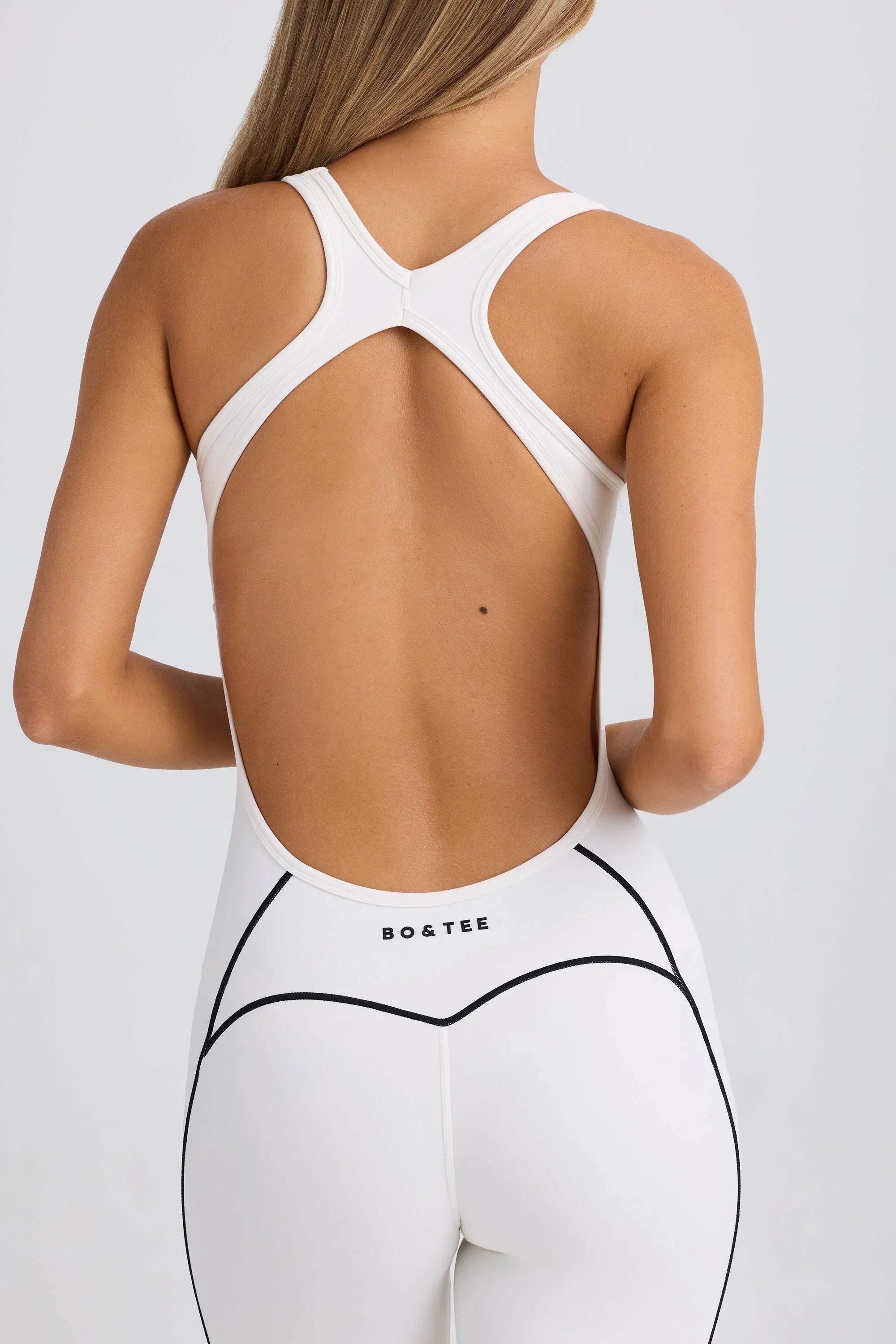 Petite Soft Active Open Back Jumpsuit in White