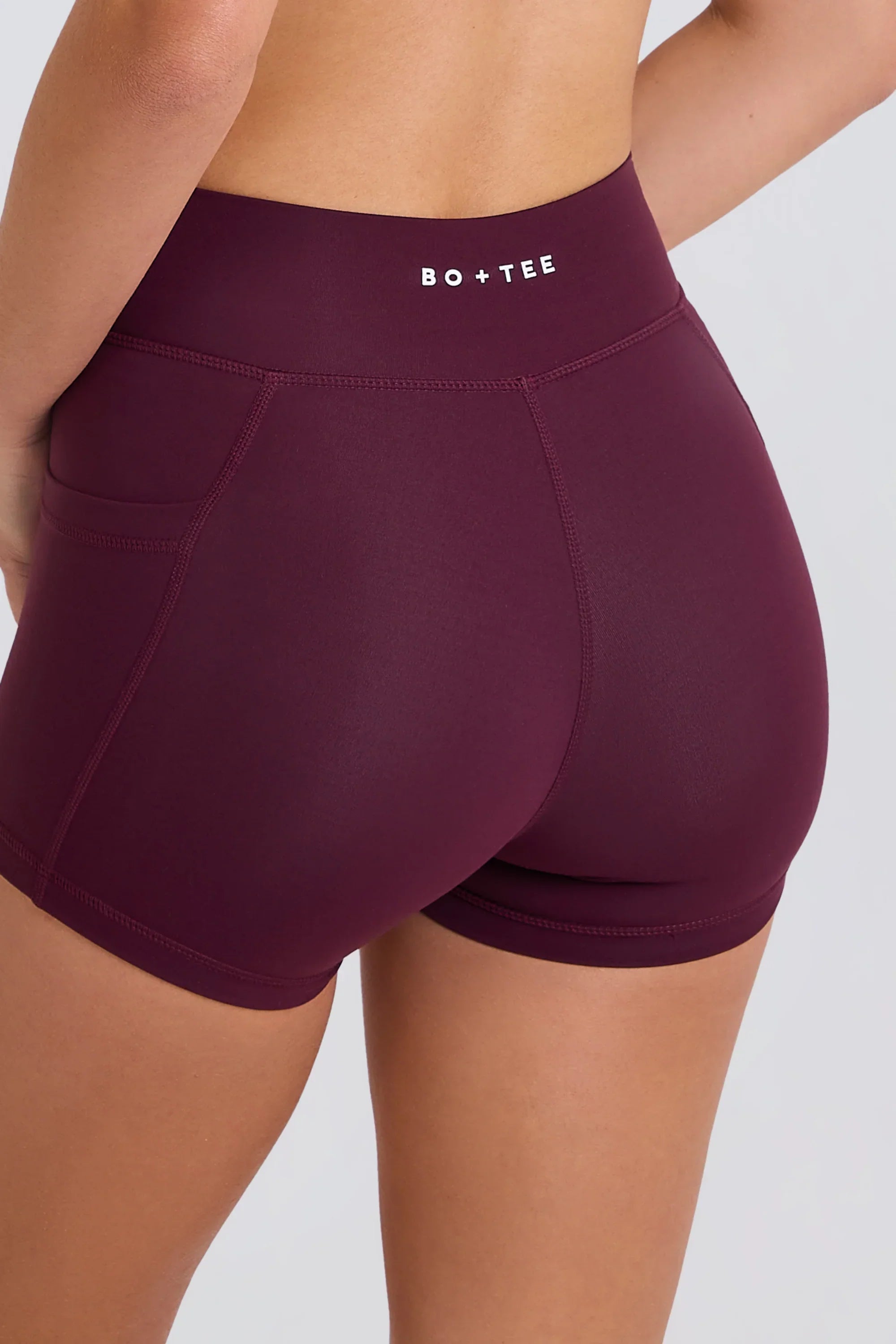 Soft Active V Waist Pocket Mini Shorts in Burgundy