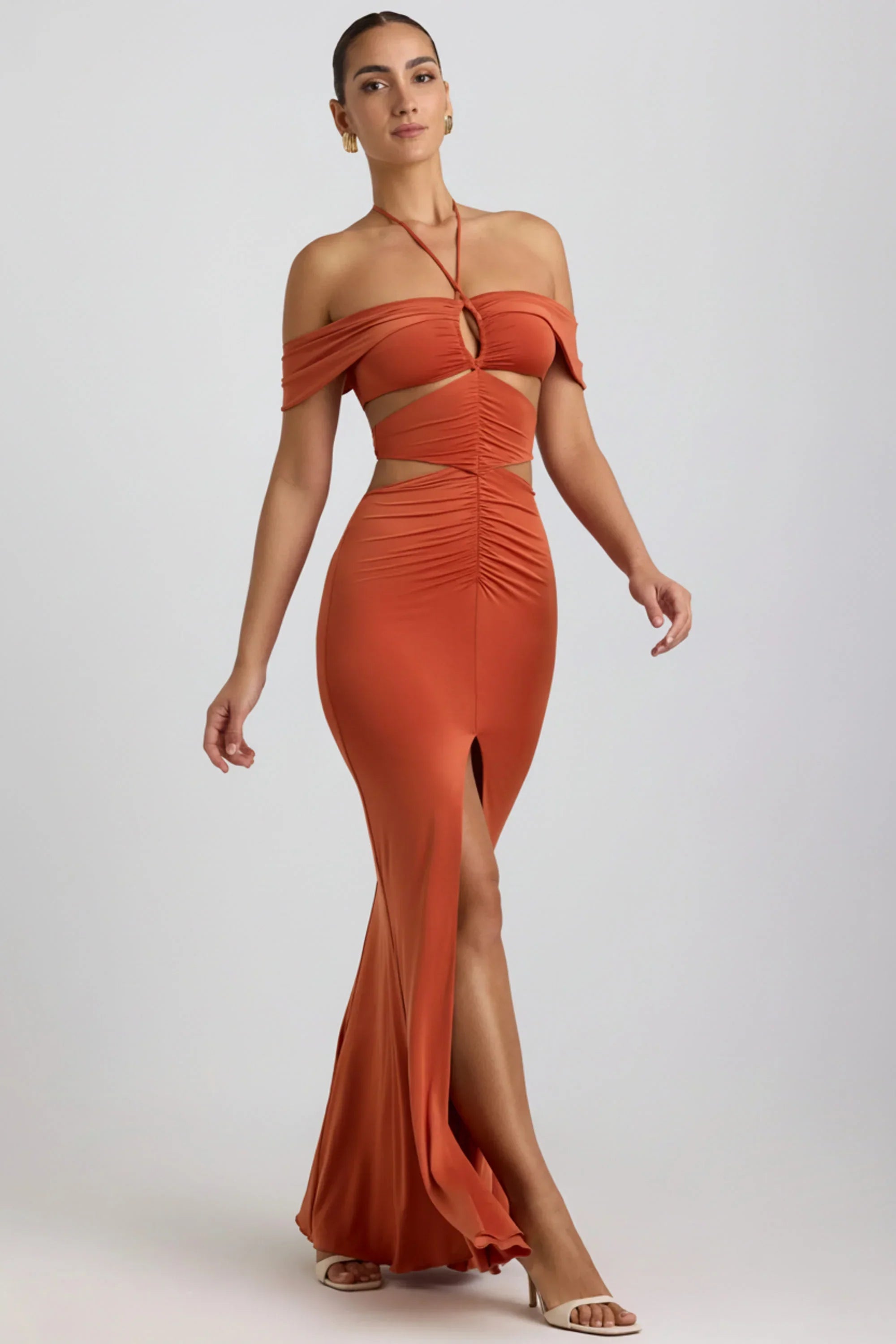 Slinky Jersey Cut Out Halterneck Gown in Burnt Orange