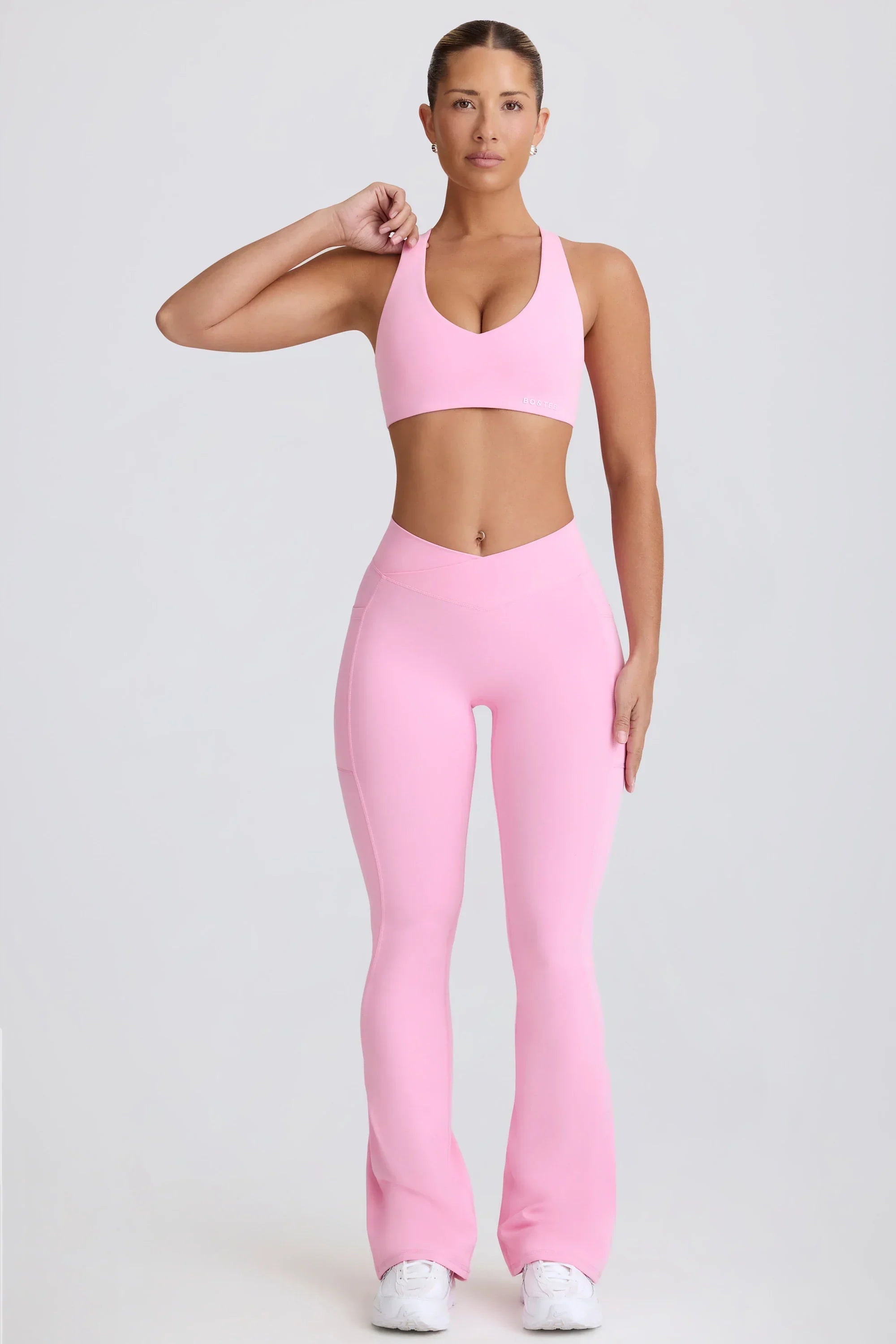 Soft Active V Waist Pocket Flared Leggings in Baby Pink