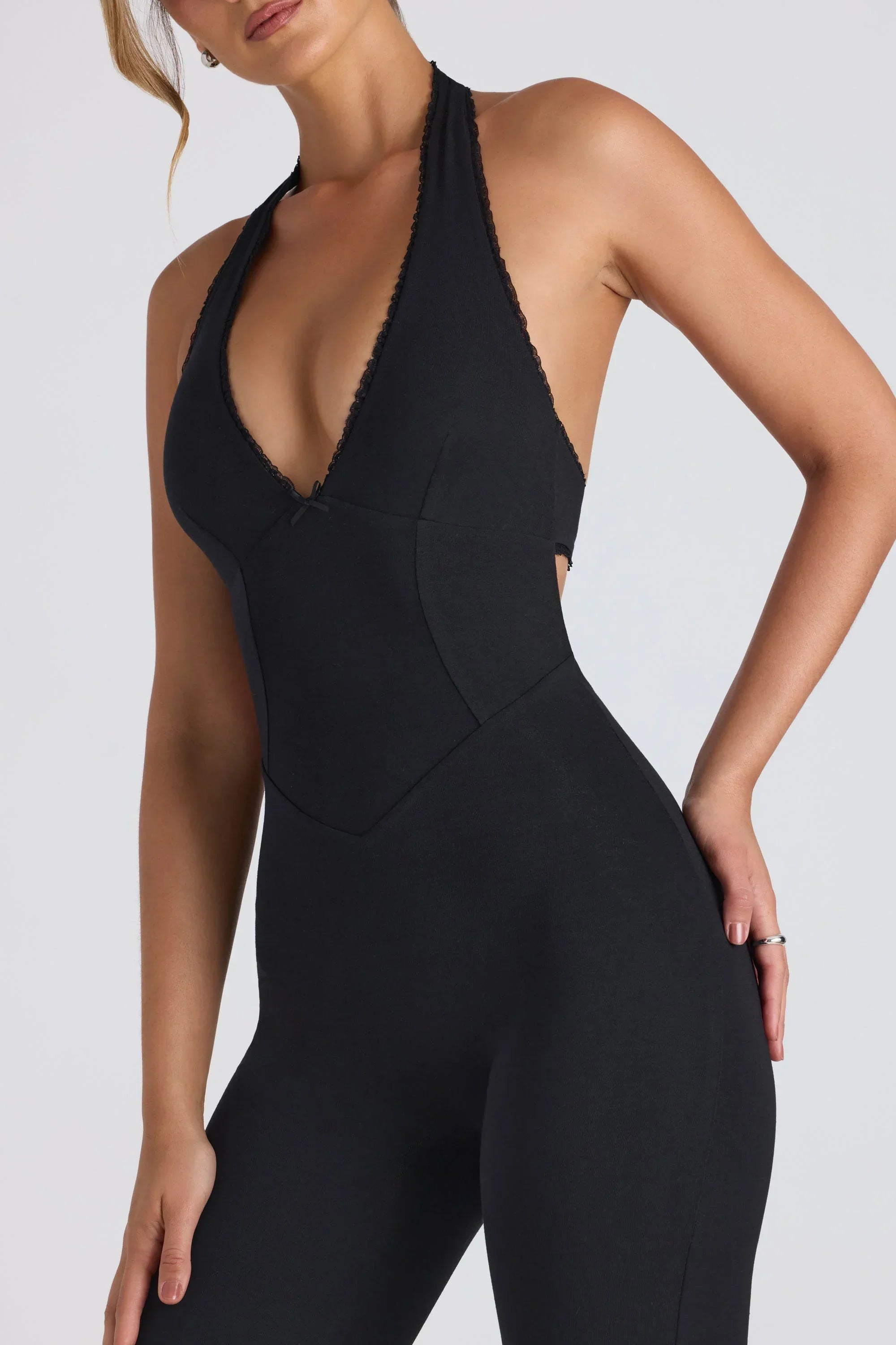 Modal Lace Trim Cut Out Flared Jumpsuit in Black