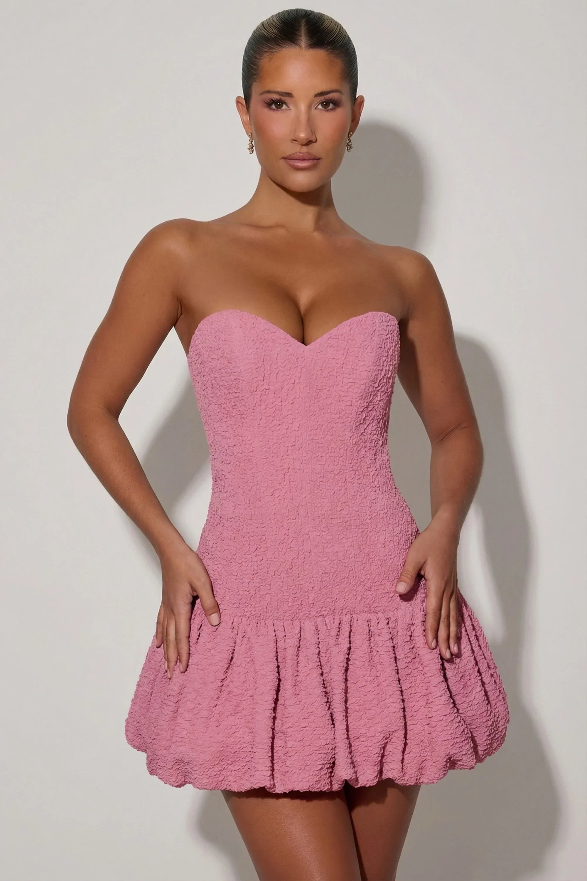 Cut Out Bubble Hem Corset Mini Dress in Dusty Pink